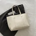 Minimalist cream white PU leather tote bag with vertical stitching for work - White