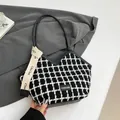 Chic black and white tweed shoulder bag with leather handles and fashion tag - Black Lattice