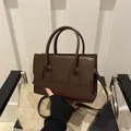 Minimalist dark brown tote bag with dual handles and detachable crossbody strap - Brown