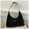 Black corduroy hobo bag with vintage leather straps and fashion label tag - Black
