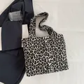 Chic leopard print canvas tote bag in black and white pattern for casual everyday use - Black