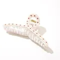 Detailed view of pink acetate hair claw clip with rhinestones and golden metal spring - Lotus Pink
