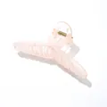 Close-up of a large matte peach hair claw clip with golden metal spring on white background - Lotus Pink