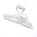 Detailed view of the matte translucent white large hair claw clip with golden metal spring - Cross Gray