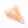 Dettaglio del fermaglio per capelli in acrilico arancione con molla in metallo - Arancio chiaro