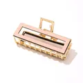 Elegant gold metal rectangular hair claw clip with a soft pink acetate inlay finish - Pink With Black Border