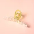 Detalle de una pinza para el pelo transparente amarillo claro de 11cm con muelle fuerte - Amarillo Claro Transparente