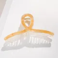 Detail of 13cm marble texture hair claw clip with golden spring on white background - Amber Marble Texture (A)