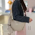 Beige large capacity crescent crossbody bag with small round coin purse attachment - Khaki