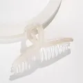 Detail of 13cm marble hair claw clip with cream translucent finish on white stage - Creamy Beige Marble (D)