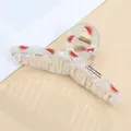 Close-up of a large iridescent acrylic hair claw clip with fresh watermelon pattern - Watermelon / Standard