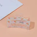 Pinza para el pelo rectangular irisada con patrón de fresa y texto Barrette La France - Cuadrado Zanahoria