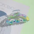 Vue détaillée d'une pince à cheveux en acrylique marbré avec des papillons colorés - Aquarelle Multicolore (B)
