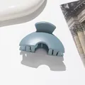 Detailed view of a matte grey-blue half-round hair claw clip on a clean white background - Sky Blue