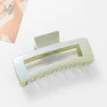 Close-up of a 12cm light green rectangular shark clip with a pearlescent finish - Green