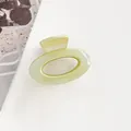 Details zur hellgrünen Glitzer-Haarklammer mit ovalem hohlem Design auf weißem Grund - Grün