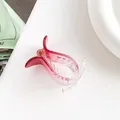 Detailed view of pink gradient resin hair claw clip with interlocking teeth design - Red