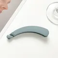 Detailed view of the matte blue banana hair clip with a non-slip clip mechanism - Sky Blue