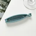 Macro view of matte blue banana clip showing the inner dense anti-slip comb teeth - Sky Blue