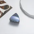 Detail view of mini glitter cat ear hair claw clip with iridescent blue finish - Gray