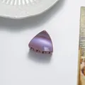 Macro shot of mini triangular hair claw clip in purple glitter finish for kids - Pink
