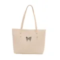 Minimalist beige tote bag with a silver butterfly logo for women's daily commute fashion - White