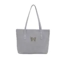 Light blue pleated tote bag with silver butterfly accent and metallic stud handles - Blue