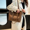 Brown matte leather tote bag with FASHION patch detail for stylish daily commuting - Brown