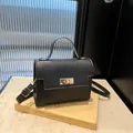 Mini Kelly-style black Saffiano leather handbag with gold hardware and shoulder strap - Black