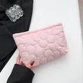 Pink quilted bucket pouch with 3D floral stitching and top zipper closure for women - Pink
