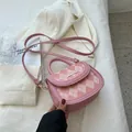 Pink quilted rhombic pattern handbag with gold clasp and adjustable shoulder strap - Pink