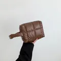 Minimalist brown quilted puffer handbag with padded stitching for a cozy winter style - Brown