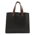 Minimalist black matte leather tote bag with brown handles and gold printed text - Black