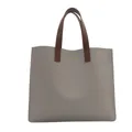 Minimalist grey faux leather tote bag with dark brown handles and golden text - Gray