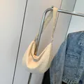 Cream-colored pleated hobo bag with unique bubble texture and matching shoulder strap - Khaki