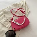 Sac bandoulière rose fuchsia avec chaîne perle et cœur et bandoulière nouée élégante - Rose rosé
