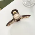 Detail von 11cm brauner Haarklammer mit runden Barrette La France Goldbuchstaben - Kaffeebraun