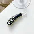 Detail of banana hair clip with colorful rhinestones and clear spiral buckle - Black