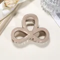 Detail of khaki flower-shaped hair claw clip on soft fabric background with macro texture - 8cm / Khaki