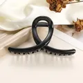 Glänzende schwarze Haarklammer mit gekreuzten Linien auf elegantem Champagner-Satin - 11cm / Reines Schwarz