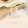 Elegant clear shark hair claw clip with pearlescent bows and sparkling crystal accents - White