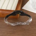 Detailed view of cloud-shaped hair claw clip with black to transparent gradient finish - Black Gradient