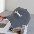 Detailed close-up of dark grey cotton twill baseball cap with white 3D Great embroidery - Adjustable / Gray