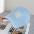 Detail of light blue baseball cap featuring California embroidery and soft cotton texture - Adjustable / Blue