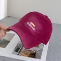 Close-up of burgundy distressed baseball cap featuring white California 3D embroidery - Adjustable / Burgundy