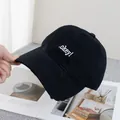 Detailed shot of black cotton baseball cap with .okey! embroidery and distressed brim - Adjustable / Black