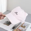 Detailed view of pink baseball cap featuring cute 3D cat ears and M NIU NIU embroidery - Adjustable / Pink