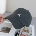 Detail of embroidered 'oi look at me' text on dark grey cotton twill baseball cap - Adjustable / Dark Gray