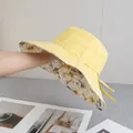 Detail of yellow sun hat featuring floral inner brim and matching windproof strap - Reversible / Double Sided Floral Style / Yellow