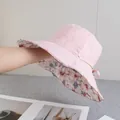 Detail of pink cotton sun hat featuring floral pattern lining and wide brim design - Reversible / Double Sided Floral Style / Pink